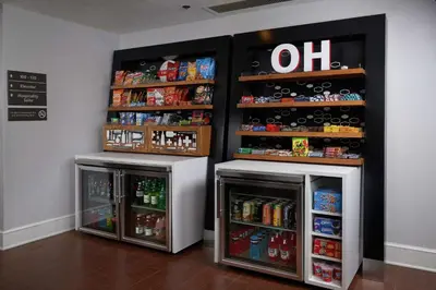 a soda shop with two refrigerators and a shelf with drinks at Hampton Inn by Hilton Youngstown-West I-80 in Mineral Ridge