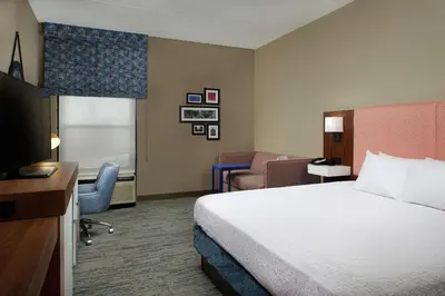 a hotel room with a bed and a television at Hampton Inn by Hilton Youngstown-West I-80 in Mineral Ridge