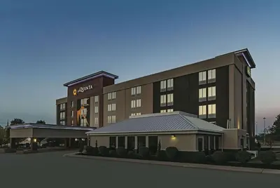 a rendering of a hotel with a building at La Quinta by Wyndham Cleveland Airport West in North Olmsted