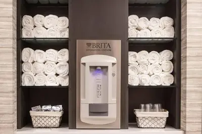 a shelf with a soap dispenser in a store at Courtyard Cincinnati Airport South/Florence in Florence
