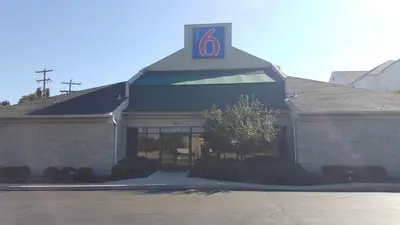 a building with a sign on the top of it at Motel 6-Columbus, OH - OSU in Columbus