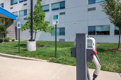 a parking meter in front of a building at Holiday Inn Express Lexington - Horse Park Area by IHG in Lexington