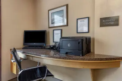 a office with a desk with a computer and a printer at Comfort Suites Mason near Kings Island in Mason