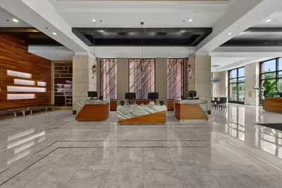 a lobby with desks and chairs in a building at Cleveland Marriott Downtown at Key Tower in Cleveland