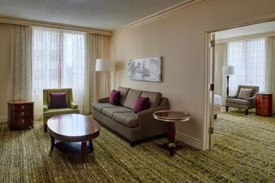 a living room with a couch and a table at Cleveland Marriott Downtown at Key Tower in Cleveland