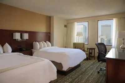 a hotel room with two beds and a large window at Cleveland Marriott Downtown at Key Tower in Cleveland