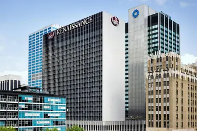 a tall building with a sign on the side of it at Renaissance Columbus Downtown Hotel in Columbus
