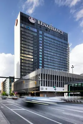 a tall building with a sign on the side of it at Renaissance Columbus Downtown Hotel in Columbus