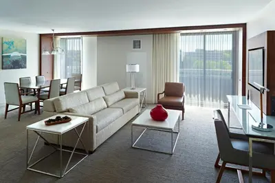 a living room with a couch and a table at Marriott at the University of Dayton in Dayton