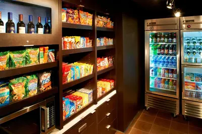 a refrigerator filled with lots of food and drinks at Courtyard Columbus Dublin in Dublin