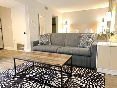 a living room with a couch and a coffee table at Sonesta ES Suites Cincinnati - Sharonville West in Sharonville