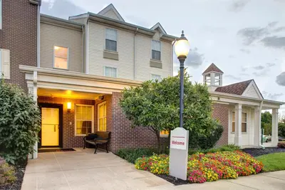 a house with a street light in front of it at Hawthorn Extended Stay by Wyndham Cincinnati NE Mason in Mason