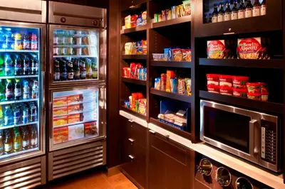 a refrigerator filled with lots of food and drinks at Courtyard Cleveland Independence in Independence