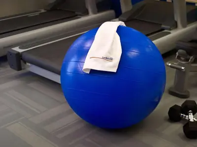 a blue gym ball with a towel on it at Sonesta Simply Suites Dublin Columbus in Dublin