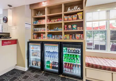 a convenience store with two refrigerators and drinks at Birch Hills Suites - Blue Ash in Blue Ash