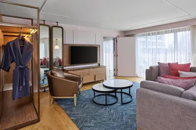 a living room with a couch and a table at Marriott Lexington Griffin Gate Golf Resort & Spa in Lexington