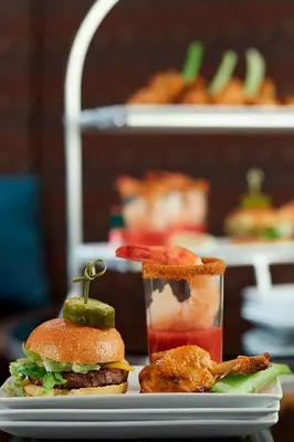 a plate of food with a sandwich and a drink at Columbus Airport Marriott in Columbus