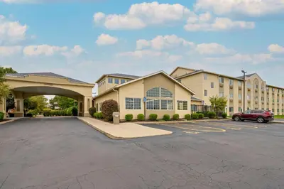 a parking lot in front of a building at Comfort Suites Columbus Expo Center in Columbus