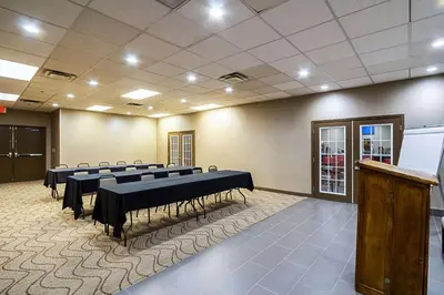 a conference room with rows of tables and chairs at Comfort Inn Cleveland Downtown in Cleveland