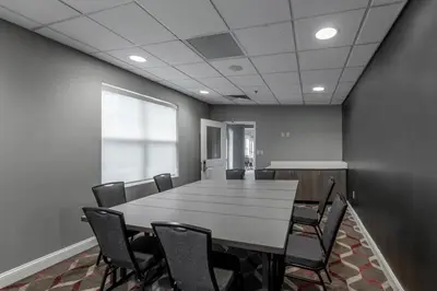 a conference room with a large table and chairs at Residence Inn Columbus Easton in Columbus