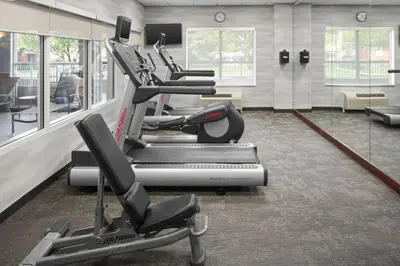a gym with several treadmills and a treadmill at Fairfield Inn & Suites Columbus OSU in Columbus