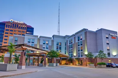 a rendering of the exterior of a hotel at SpringHill Suites by Marriott Cincinnati Midtown in Cincinnati