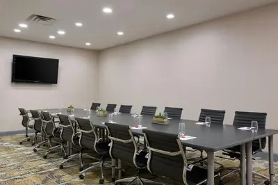 a conference room with a long table and chairs at Marriott Columbus Northwest in Dublin