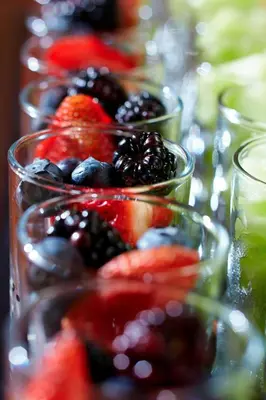 a display of fruit in glass bowls on a table at Marriott Cincinnati North in West Chester