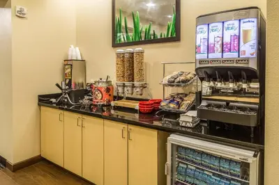 a kitchen with a counter with a drink bar at TownePlace Suites Dayton North in Dayton