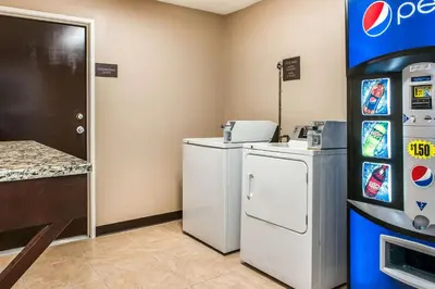 a gas station with a washer and dryer at Comfort Inn & Suites Mount Sterling in Mount Sterling
