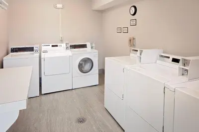 a laundry room with a washer and dryer at Residence Inn by Marriott Lexington North in Lexington