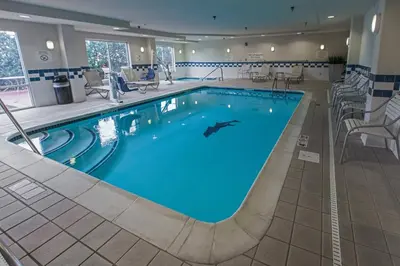 a swimming pool in a hotel room at Fairfield Inn & Suites Toledo North in Toledo