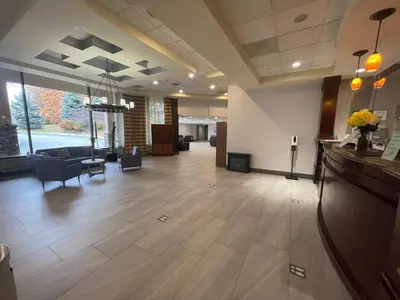 a lobby of a hospital with a waiting room at Ramada by Wyndham Cleveland Independence in Independence