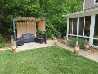 a backyard with a gazebo and a lawn at Bodee's Bungalow Adults Only Couples Only Boutique Hotel in Put-in-Bay