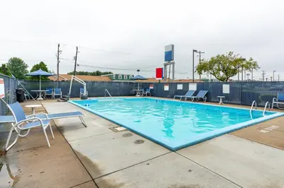 a swimming pool on top of a building at Days Inn by Wyndham New Philadelphia in New Philadelphia
