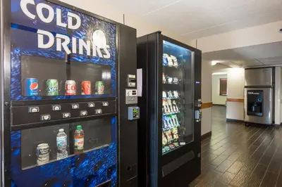 a cold drink vending machine in a store at Red Roof Inn Columbus - Ohio State Fairgrounds in Columbus