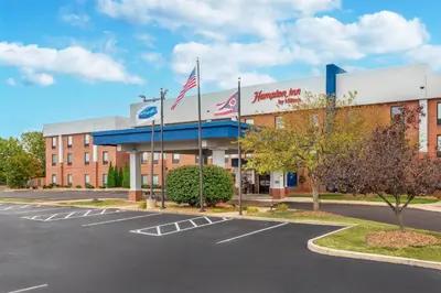 an empty parking lot in front of a hospital at Hampton Inn Akron-South in Akron