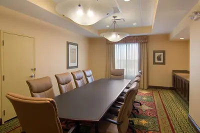 a conference room with a long table and chairs at Hilton Garden Inn Cleveland East / Mayfield Village in Mayfield