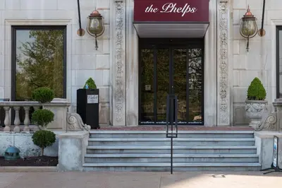 a entrance to a building with stairs and a sign on it at Residence Inn by Marriott Cincinnati Downtown/The Phelps in Cincinnati
