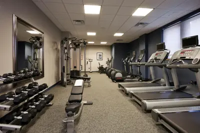 a gym with rows of treadmills and machines at Residence Inn by Marriott Cincinnati Downtown/The Phelps in Cincinnati