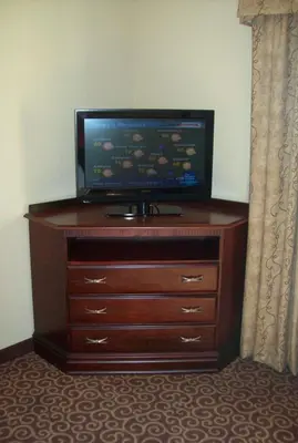a flat screen tv sitting on a dresser in a room at Hampton Inn Gallipolis in Gallipolis