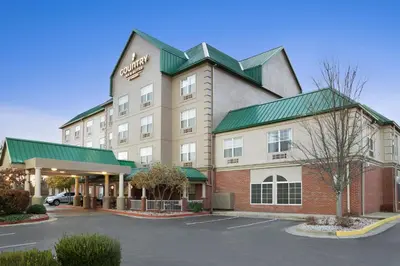 a rendering of a hotel with a parking lot at Country Inn & Suites by Radisson, Lexington, KY in Lexington