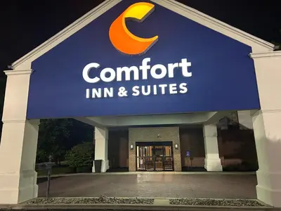 a sign for a comfort inn and suites at Comfort Inn & Suites Toledo North in Toledo