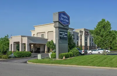 a building with a sign in front of it at Hampton Inn & Suites Youngstown-Canfield in Canfield