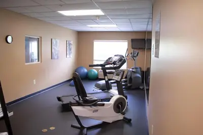 a gym with cardio equipment in a room at Holiday Inn Express & Suites Columbus East - Reynoldsburg by IHG in Reynoldsburg