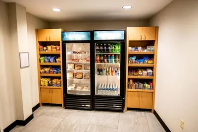 two refrigerators in a room with food and drinks at Fairfield by Marriott Inn & Suites Washington Casino Area in Washington