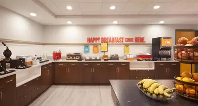 a large kitchen with a bunch of fruit on the counter at Hampton Inn & Suites Cleveland-Mentor in Mentor