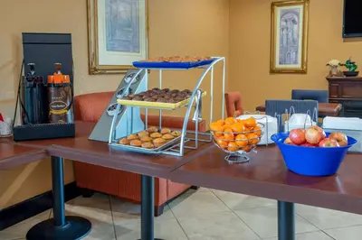 a table with a bunch of food on it at Days Inn by Wyndham Anderson IN in Anderson