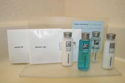 a group of three bottles sitting on a shelf at Hampton Inn Youngstown-North in Youngstown