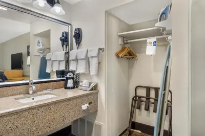 a bathroom with a sink and a mirror at Best Western Winchester Hotel in Winchester